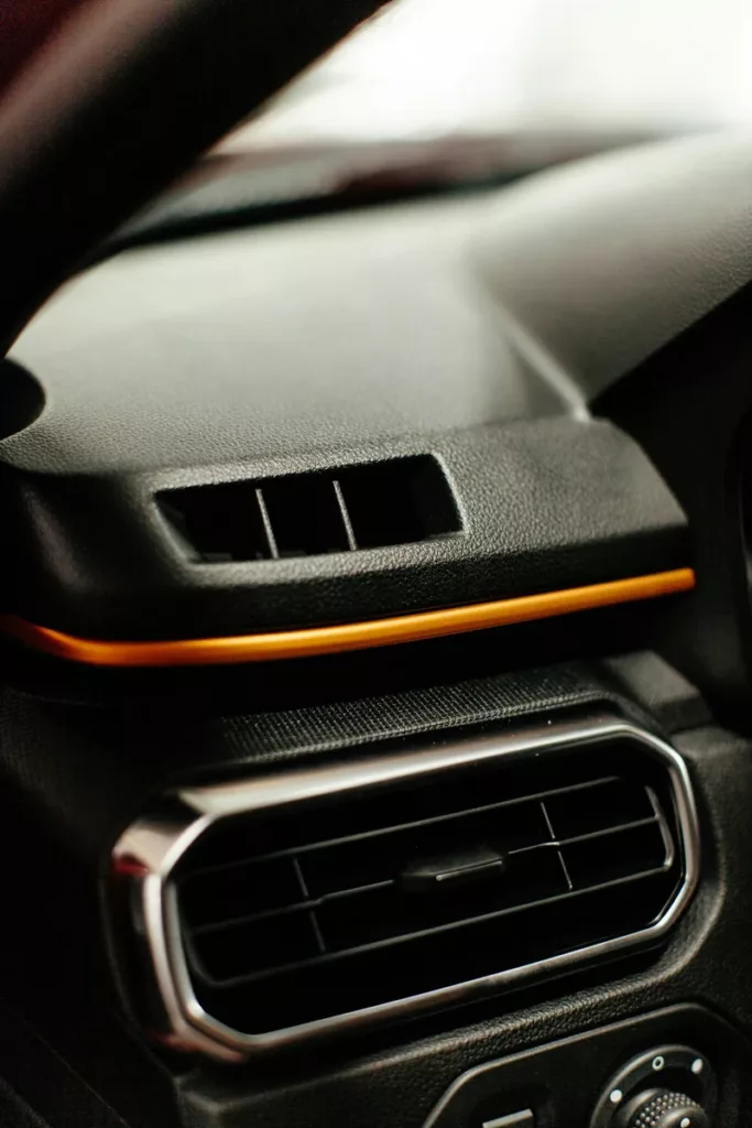 Close-up of a car air conditioning vent — A/C repair, recharge, and diagnosis at Rite-Price Auto in SE Calgary